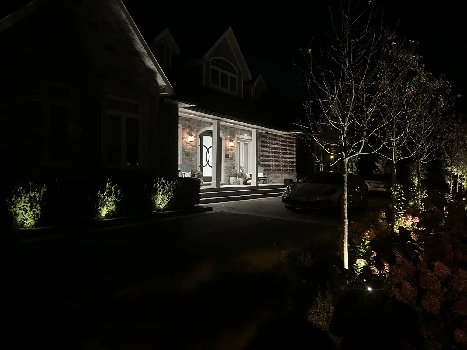 Outdoor landscape lighting around a home